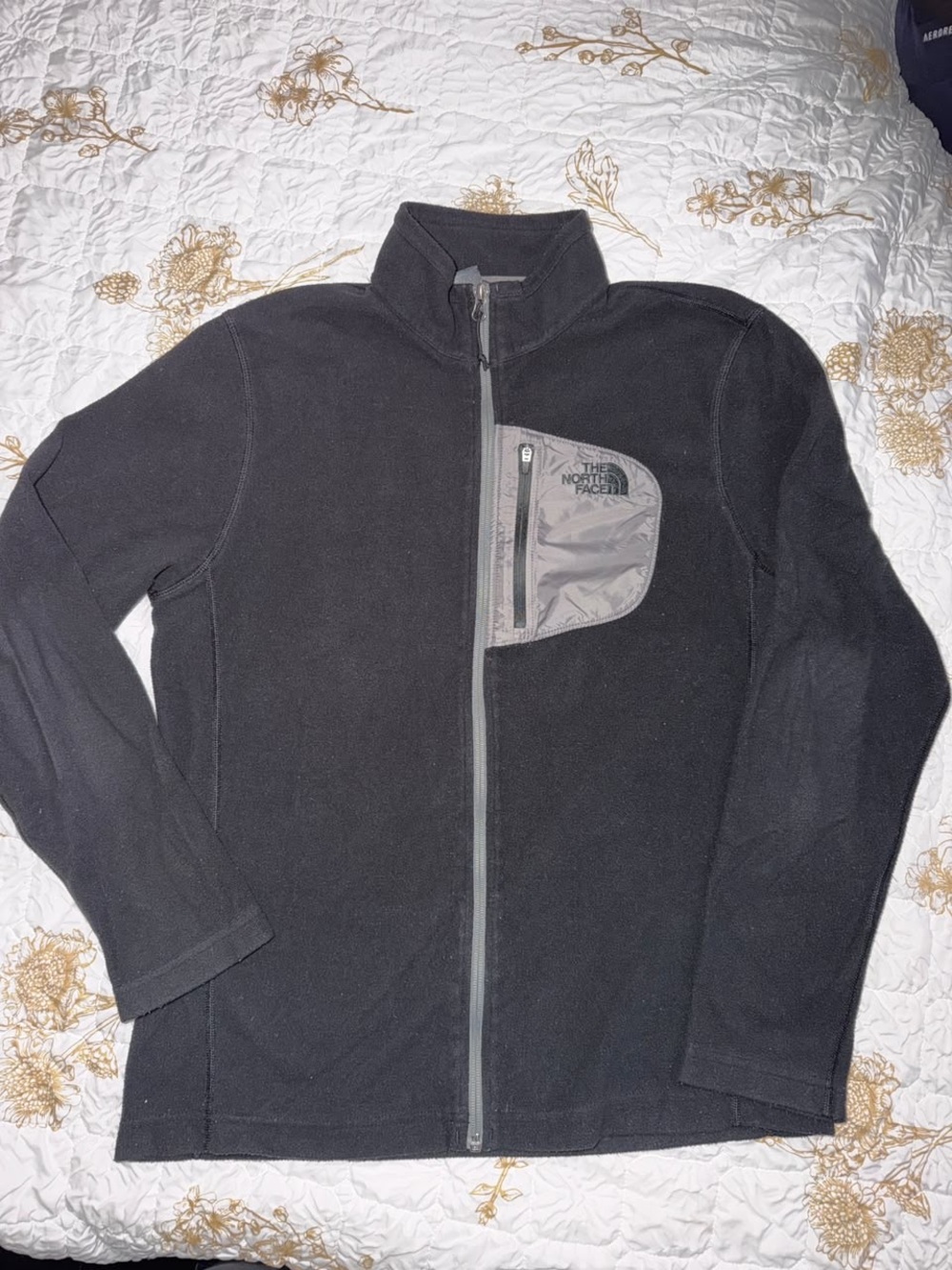The North Face Black Lightweight Fleece Jacket with Chest Zip Pocket
